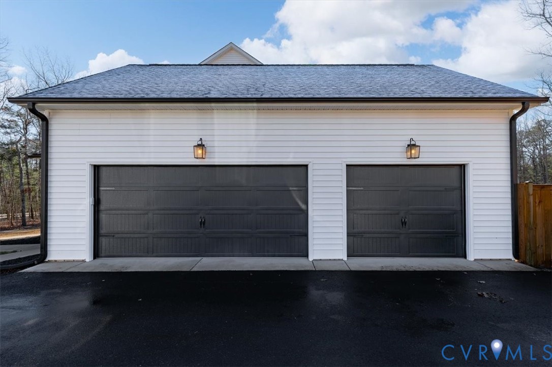 702 Hockett Road Manakin-Sabot, VA 23103 - Photo 36 of 45 a front view of a house with a parking space