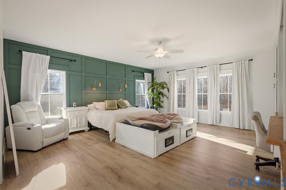 702 Hockett Road Manakin-Sabot, VA 23103 - Photo 9 of 45 a spacious bedroom with a bed and a couch