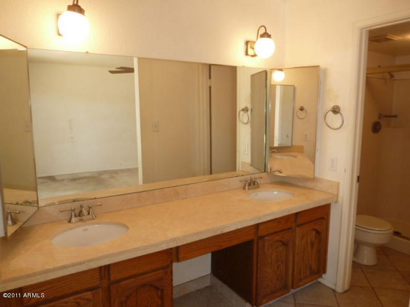 3930 West Calavar Road Phoenix, AZ 85053 - Photo 15 of 21 master bathroom