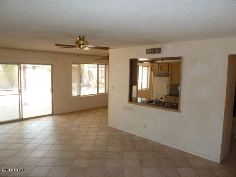 3930 West Calavar Road Phoenix, AZ 85053 - Photo 7 of 21 family roomkitchen