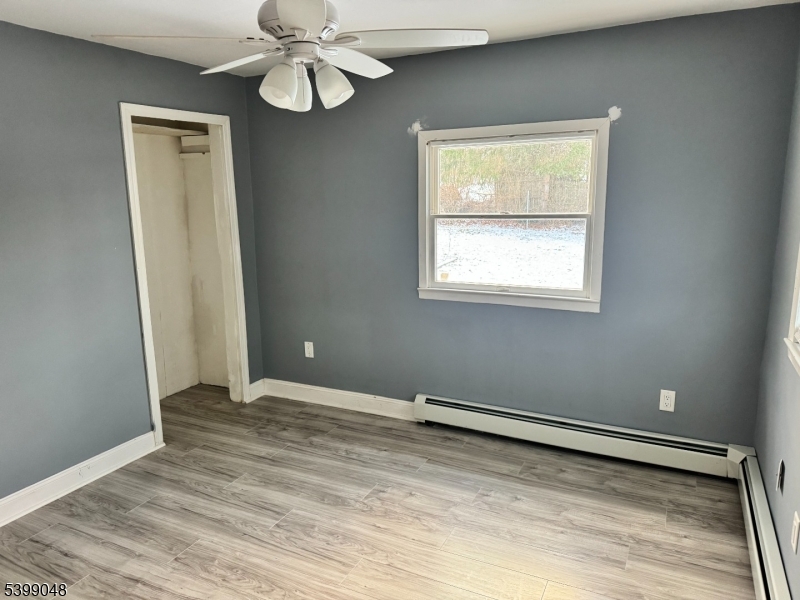24 Outlook Avenue Budd Lake, NJ 07828 - Photo 10 of 10 a view of an empty room with wooden floor and a window