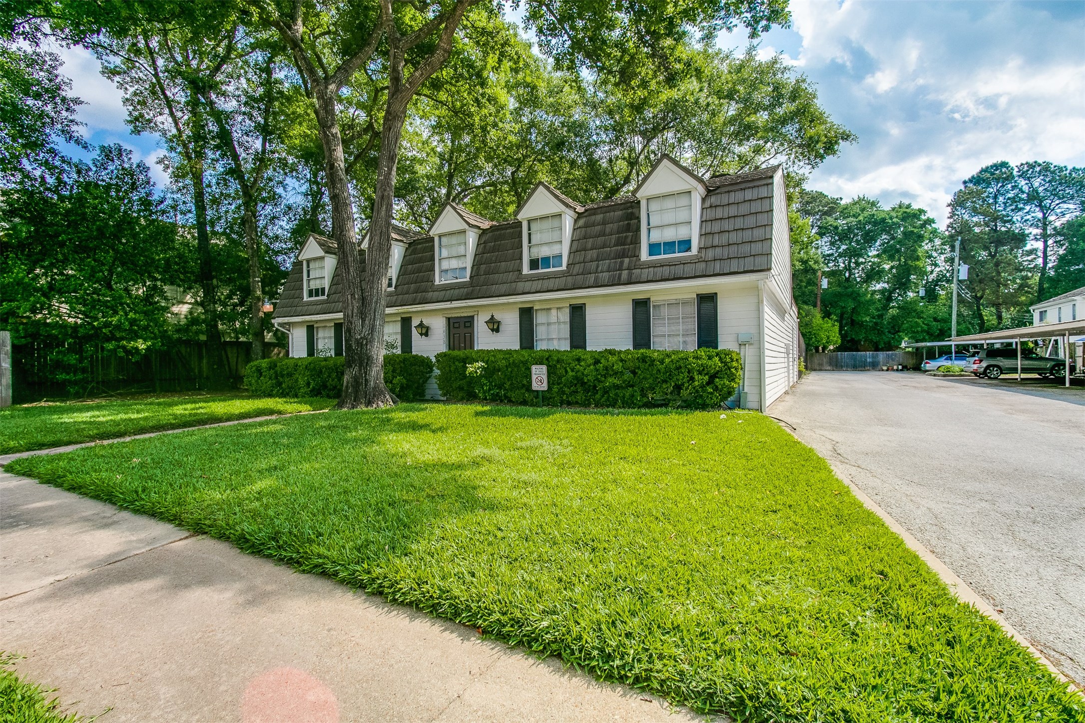 1407 Springrock Lane Houston, TX 77055 - Photo 23 of 25 Host your next large gathering at the club house situated on a beautiful lawn under gorgeous trees.