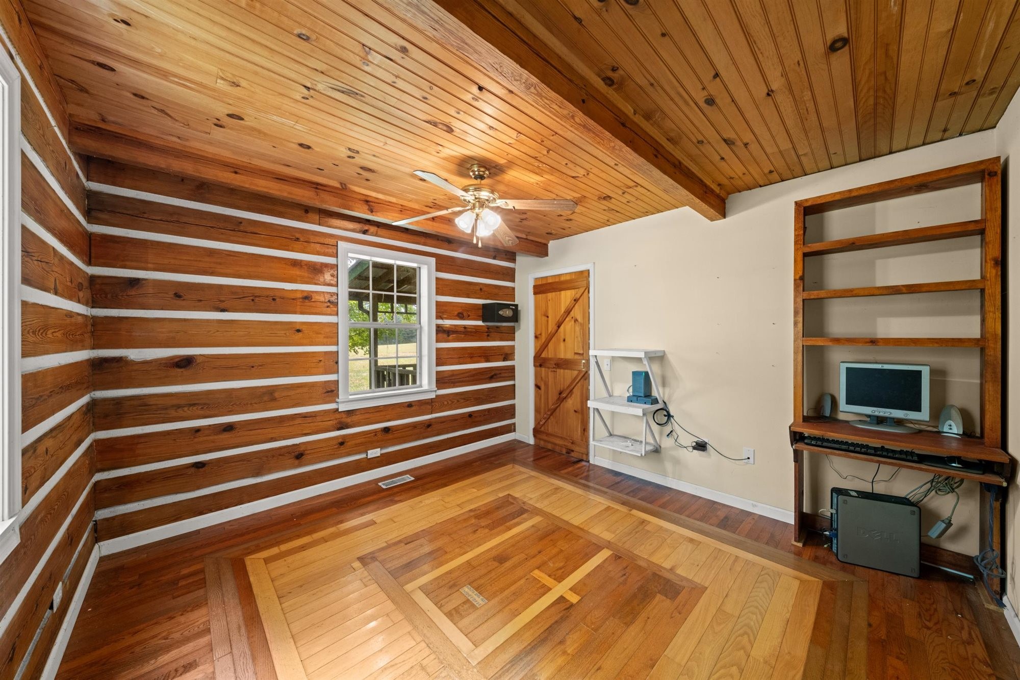 290 Lawson Town Road Crossville, TN 38572 - Photo 18 of 38 a view of a livingroom with furniture and a ceiling fan