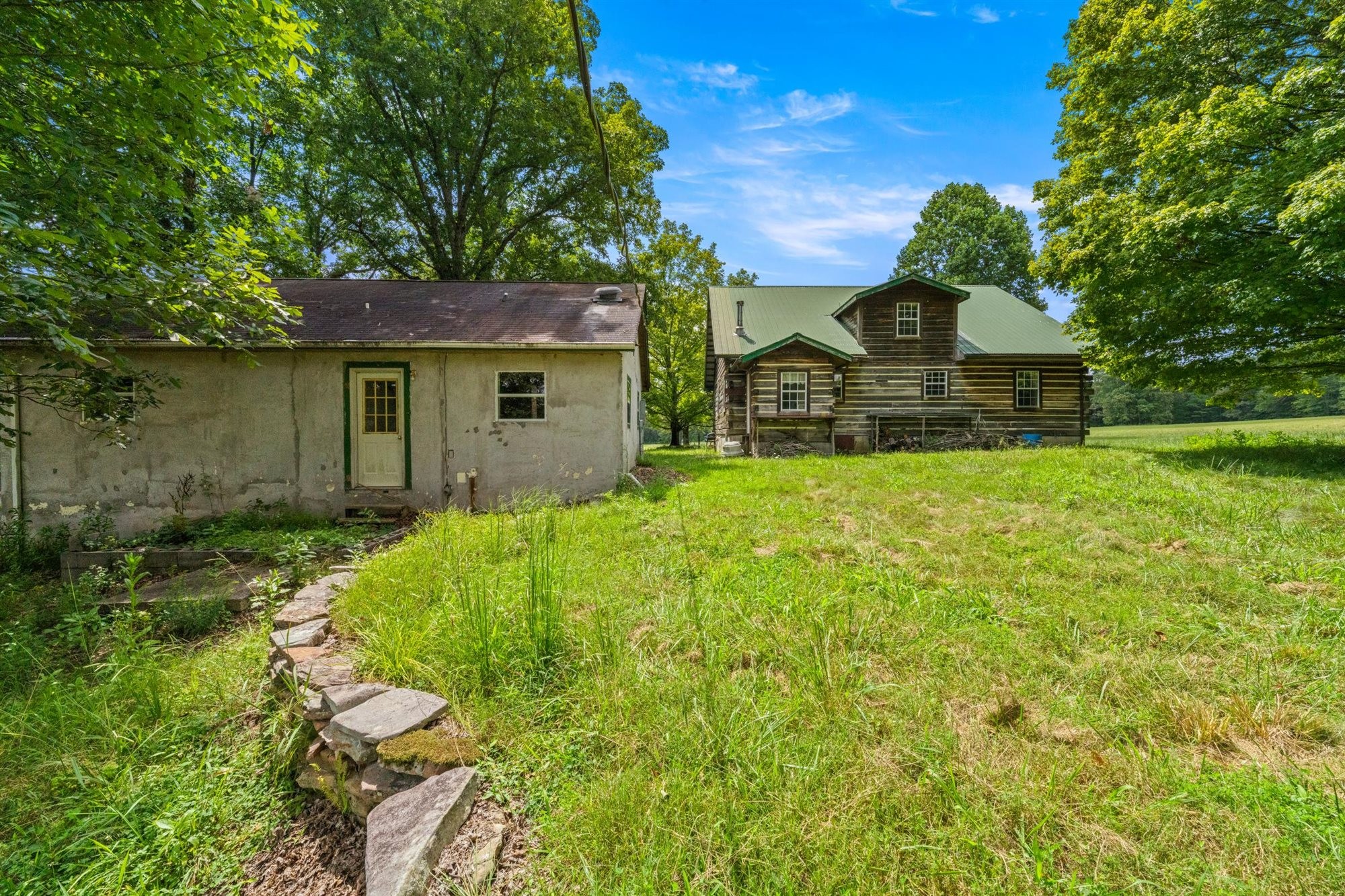 290 Lawson Town Road Crossville, TN 38572 - Photo 30 of 38 a view of a house with a yard