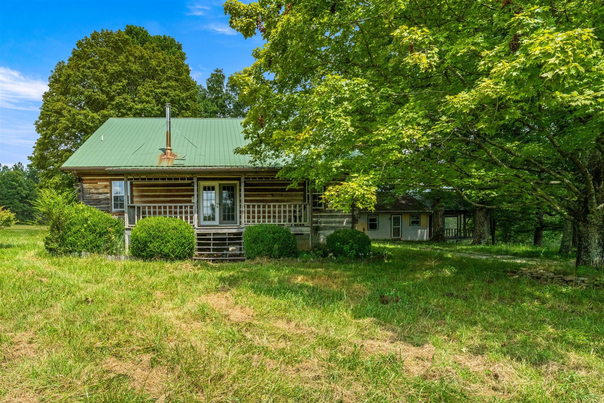 290 Lawson Town Road Crossville, TN 38572 - Photo 5 of 38 a front view of house with yard and green space