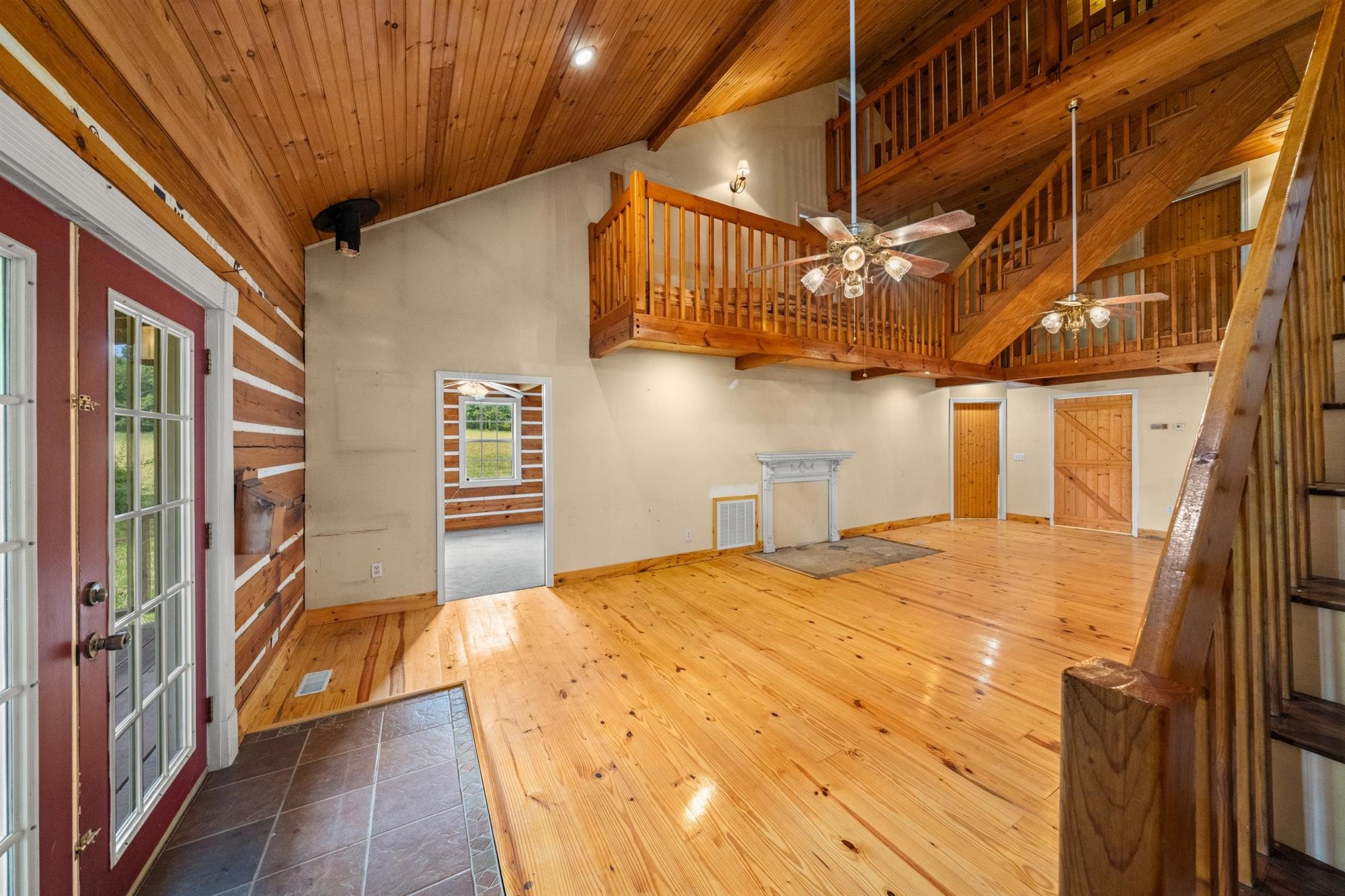 290 Lawson Town Road Crossville, TN 38572 - Photo 8 of 38 a bedroom with a bed and wooden floor