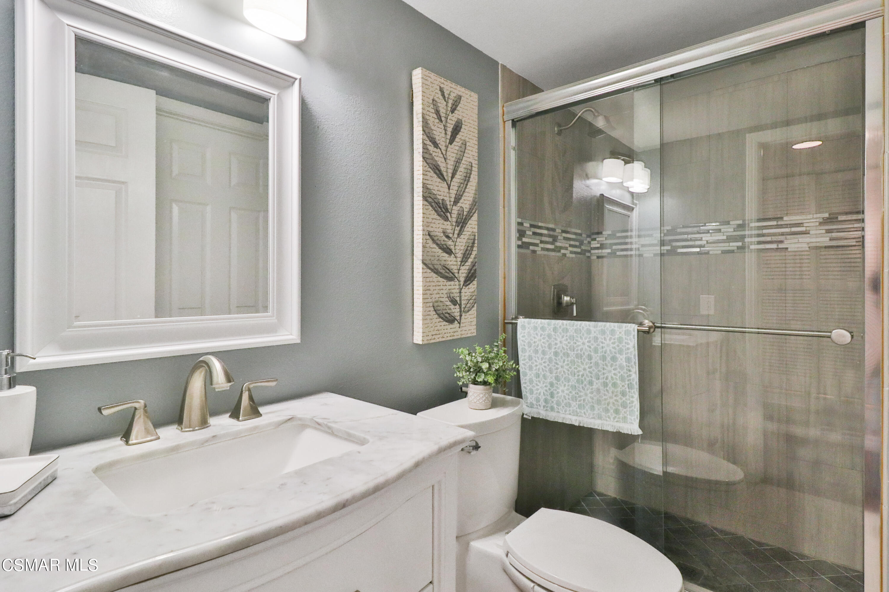 2598 Winthrop Court Simi Valley, CA 93065 - Photo 33 of 33 a bathroom with a sink toilet and shower