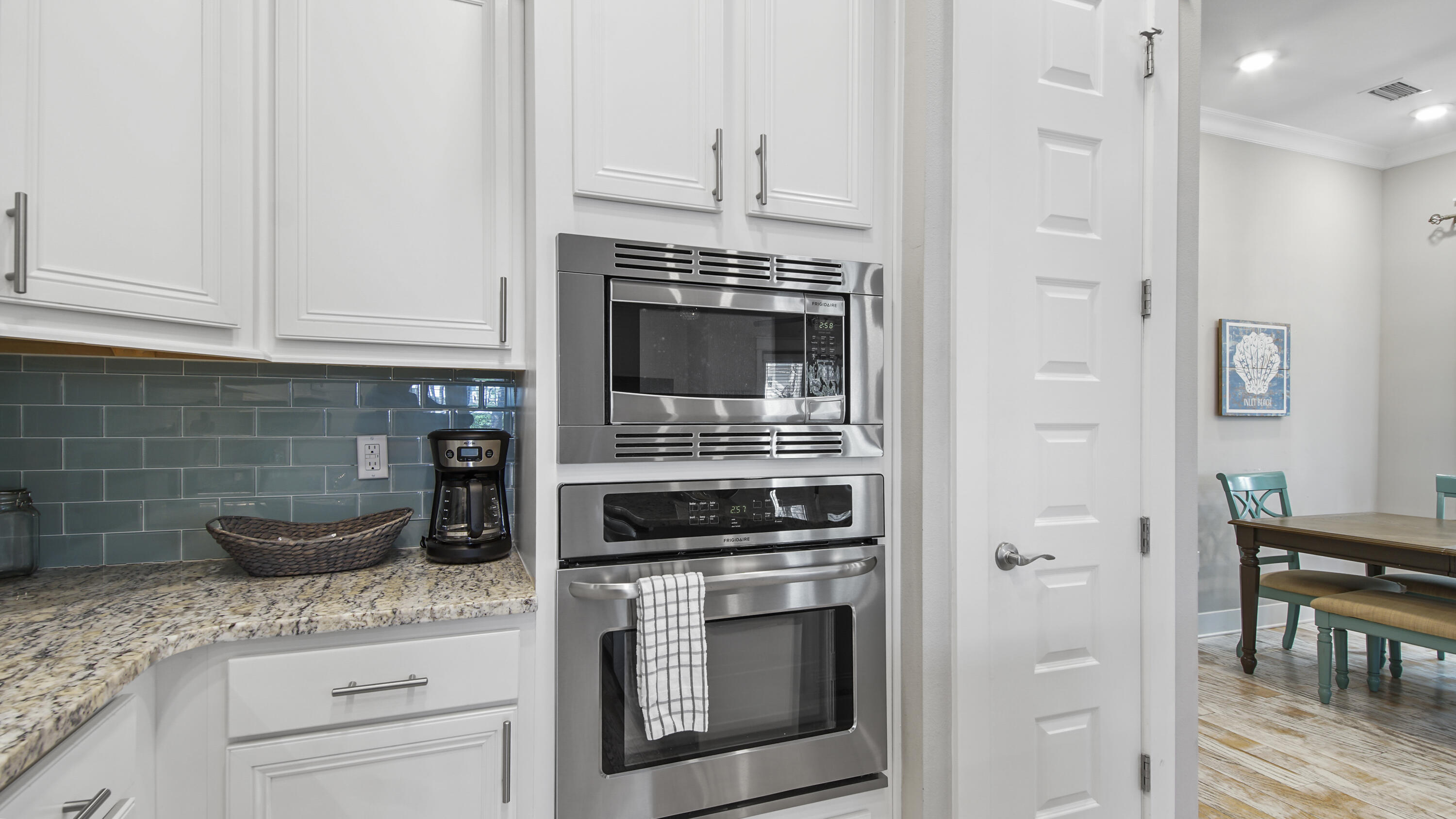 54 West W Pine, Unit A Inlet Beach, FL 32461 - Photo 11 of 27 a kitchen with cabinets and appliances