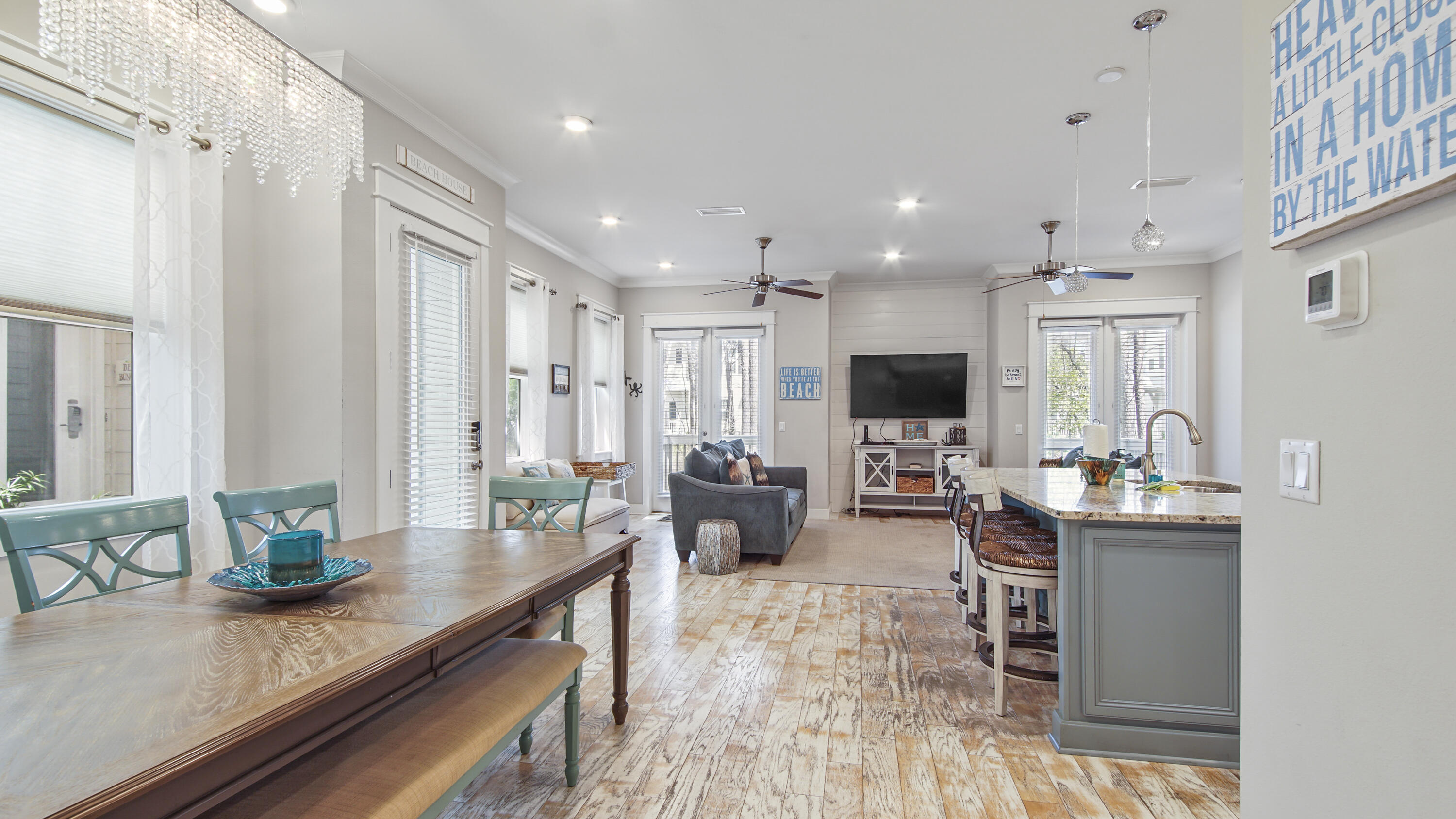 54 West W Pine, Unit A Inlet Beach, FL 32461 - Photo 13 of 27 a living room with furniture wooden floor and a view of kitchen