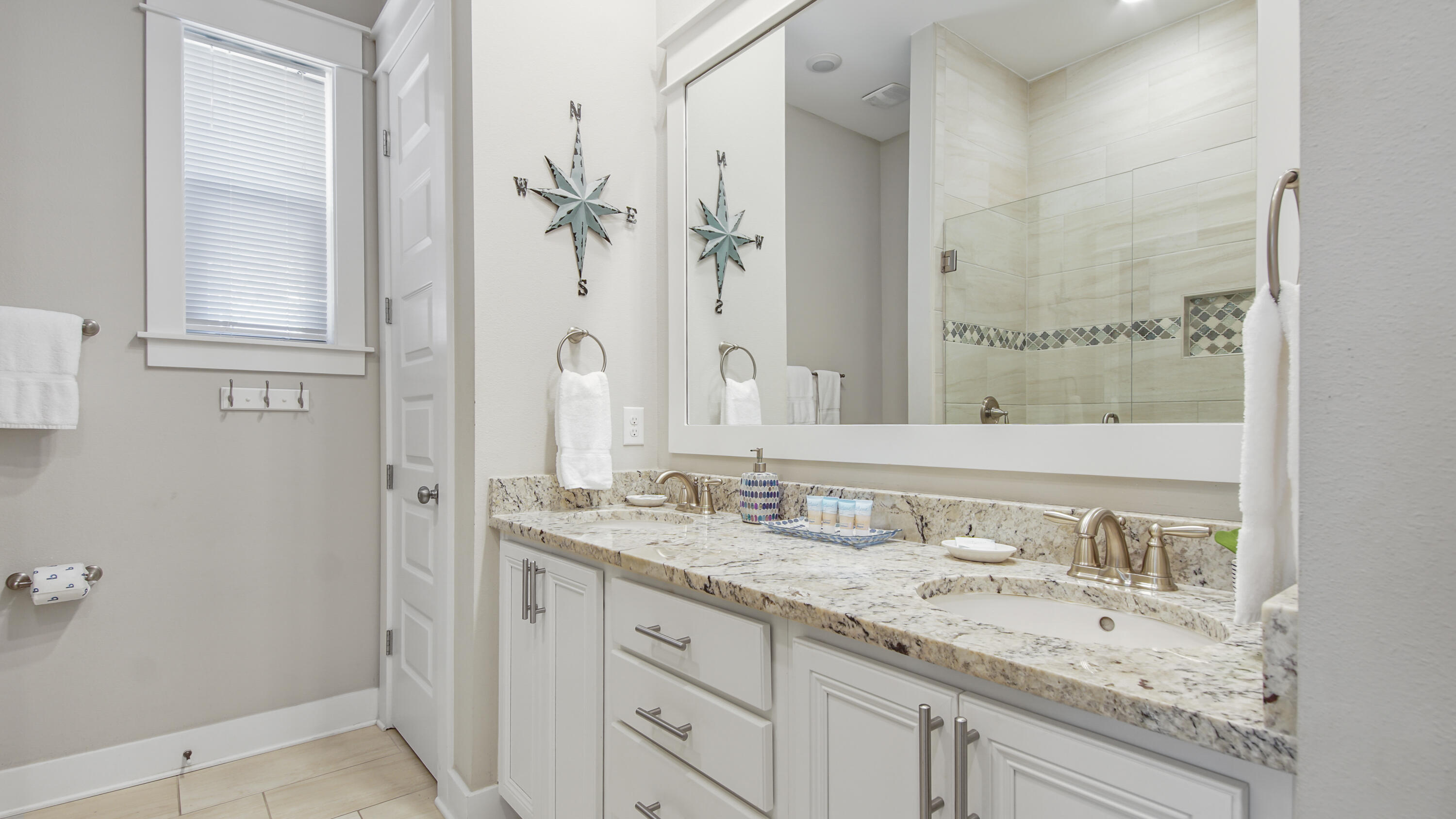 54 West W Pine, Unit A Inlet Beach, FL 32461 - Photo 17 of 27 a bathroom with a granite countertop sink and a mirror
