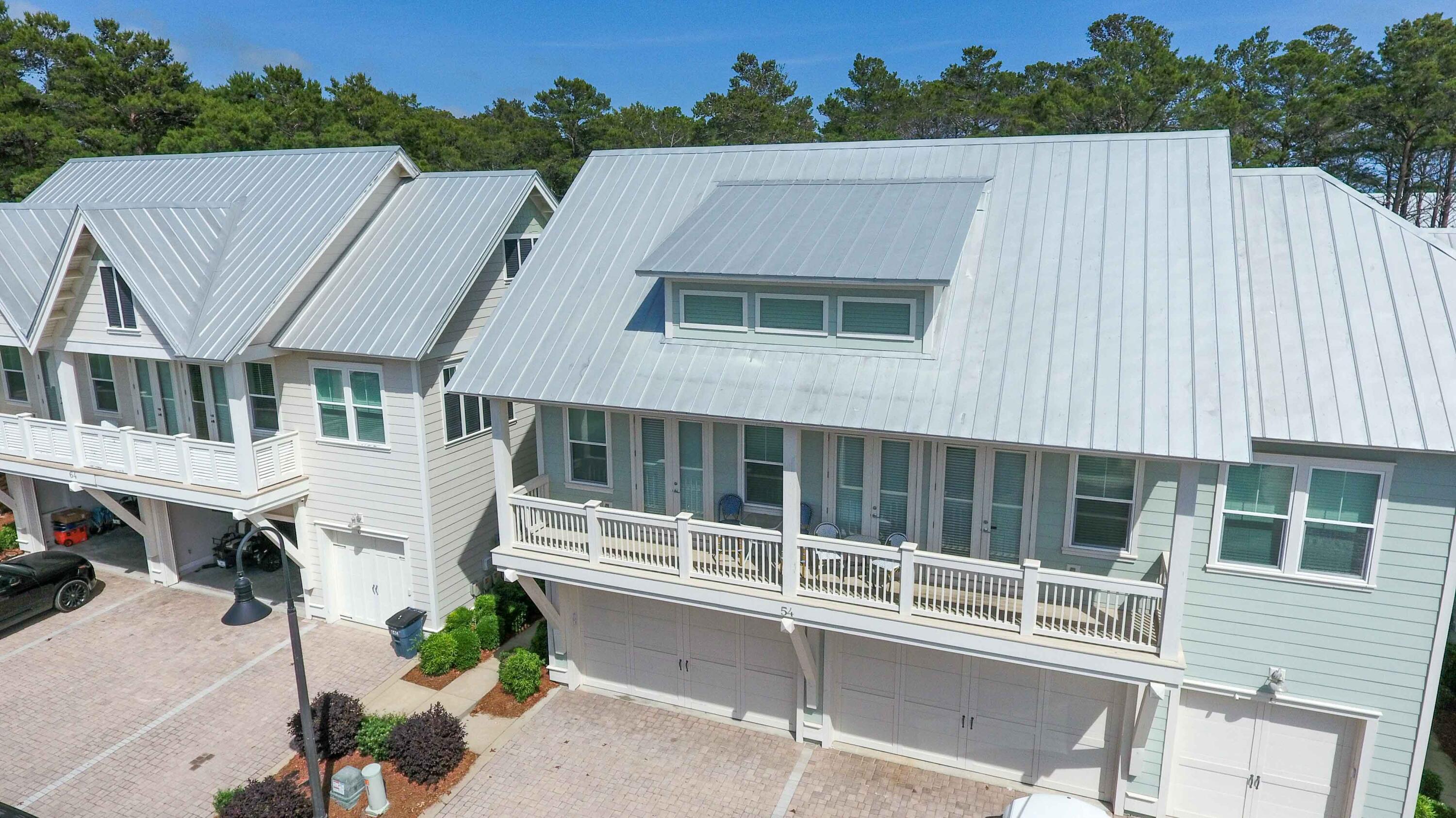54 West W Pine, Unit A Inlet Beach, FL 32461 - Photo 2 of 27 a aerial view of a house with a garden