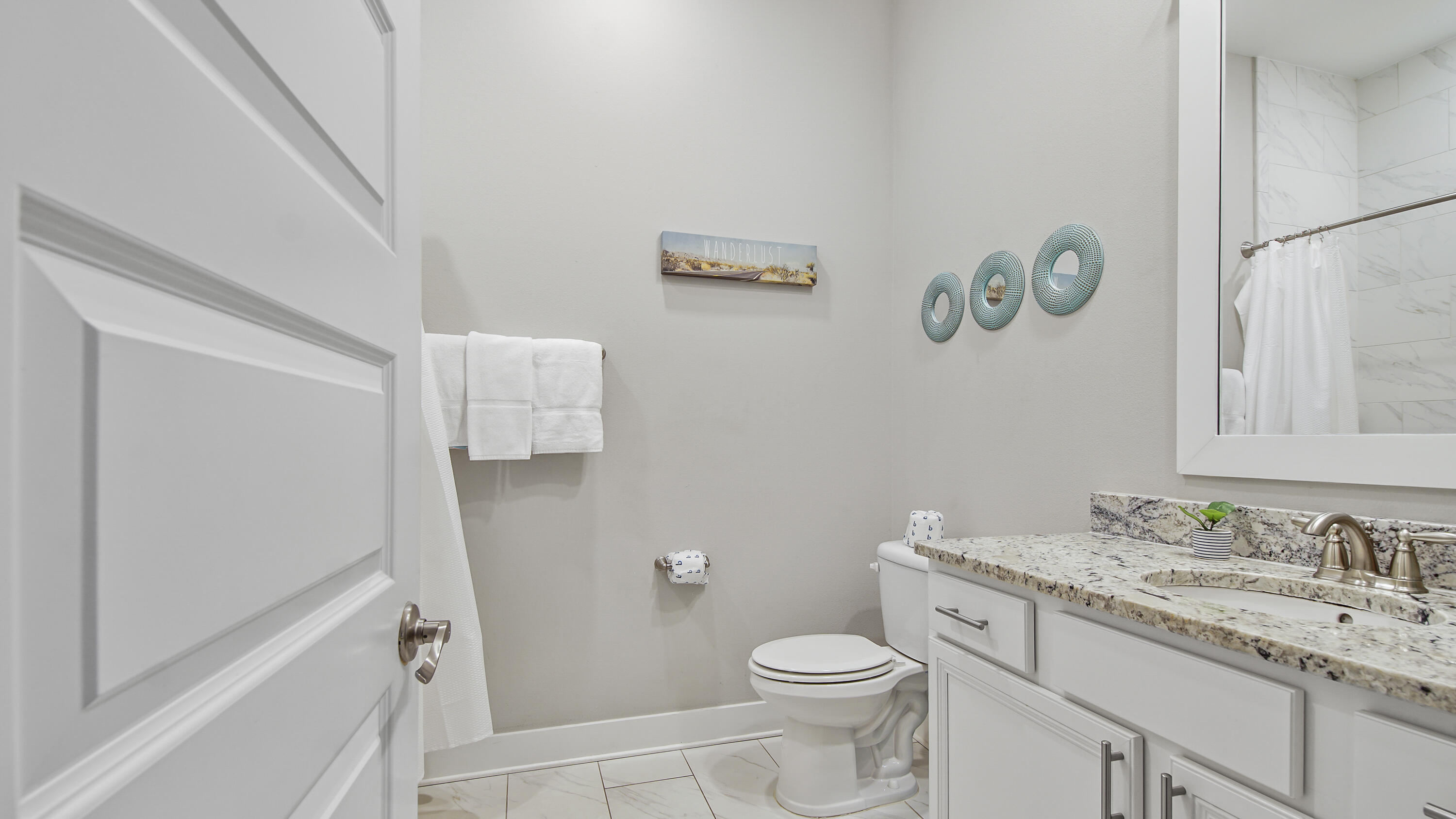 54 West W Pine, Unit A Inlet Beach, FL 32461 - Photo 23 of 27 a bathroom with a granite countertop sink toilet and shower