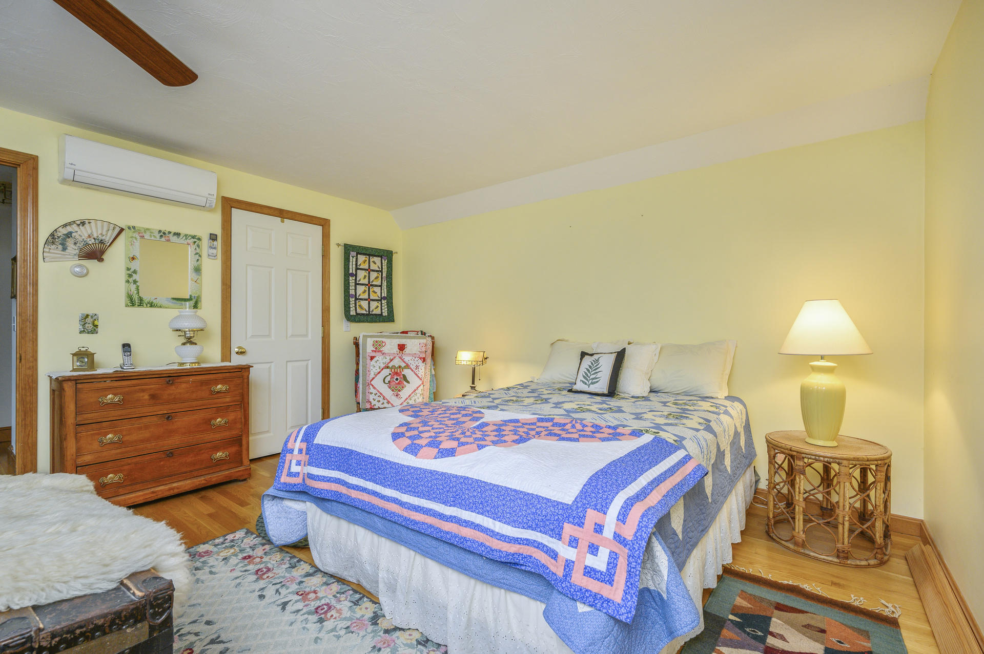85 Beach Road Orleans, MA 02653 - Photo 12 of 26 a bedroom with a bed and a dresser in it