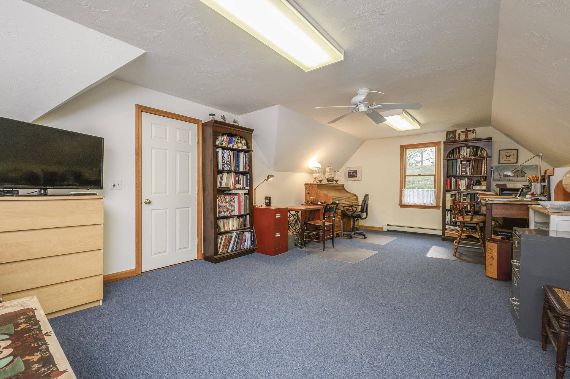 85 Beach Road Orleans, MA 02653 - Photo 13 of 26 a view of a livingroom with furniture and a flat screen tv