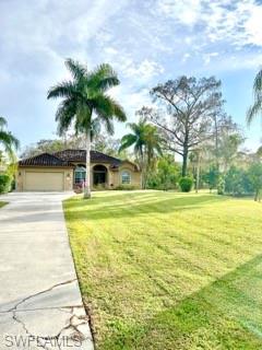 2060 16th Avenue Southwest Naples, FL 34117 - Photo 1 of 13 a swimming pool with trees in front of it