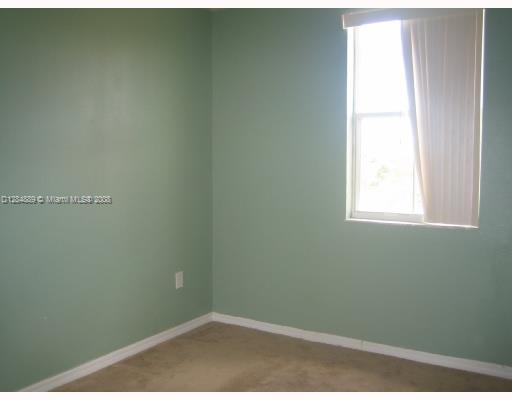 27510 Southwest 138th Path Homestead, FL 33032 - Photo 5 of 11 a small space with a window
