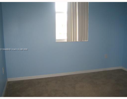 27510 Southwest 138th Path Homestead, FL 33032 - Photo 6 of 11 a view of a window in an empty room