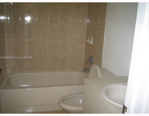 27510 Southwest 138th Path Homestead, FL 33032 - Photo 10 of 11 a bathroom with a bathtub