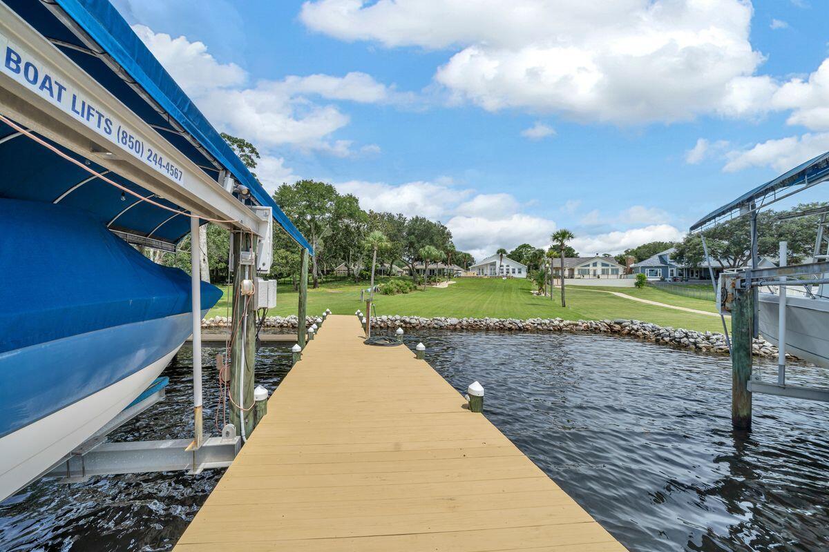 245 Country Club Road Shalimar, FL 32579 - Photo 11 of 46 a park with lots of trees in the background