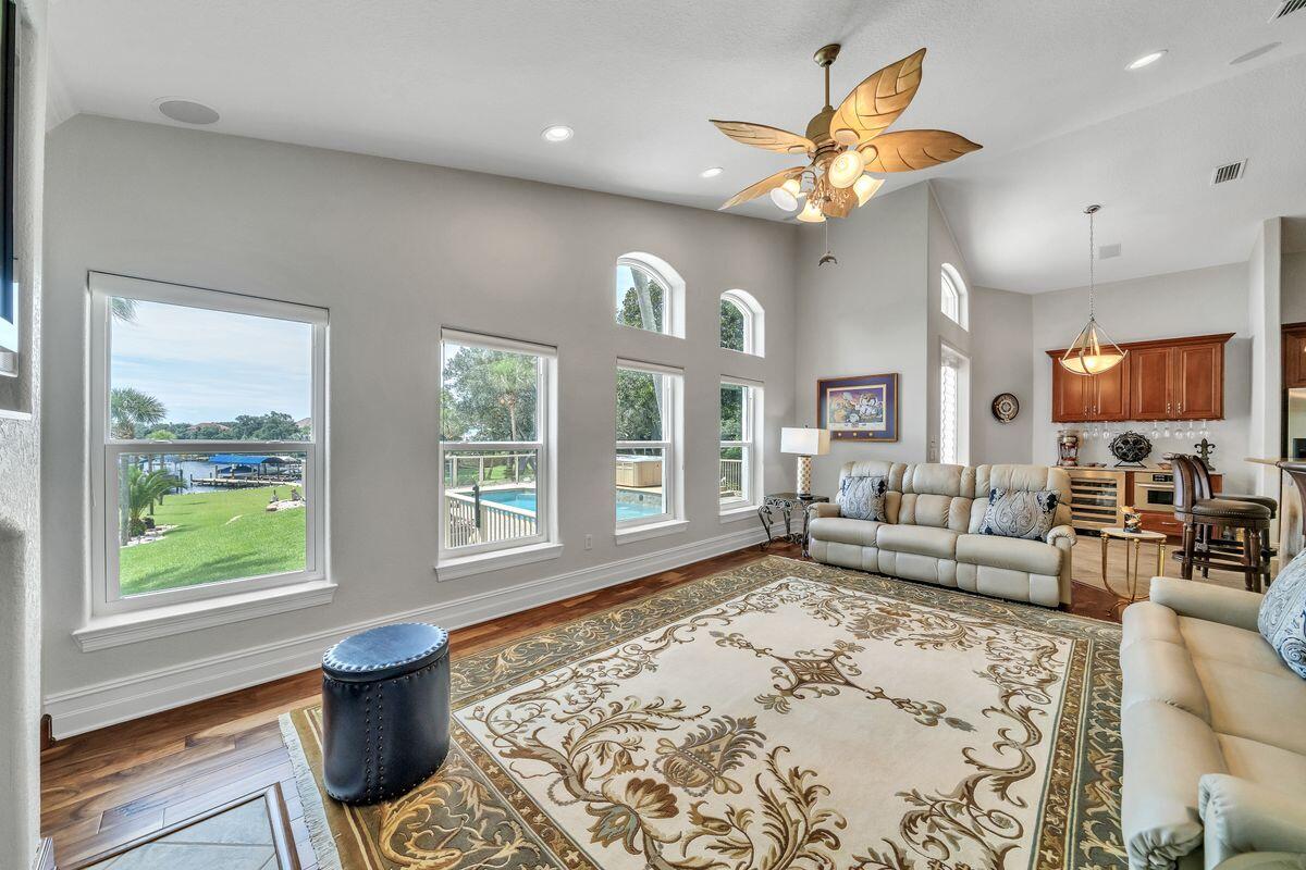 245 Country Club Road Shalimar, FL 32579 - Photo 15 of 46 a living room with furniture and a large window