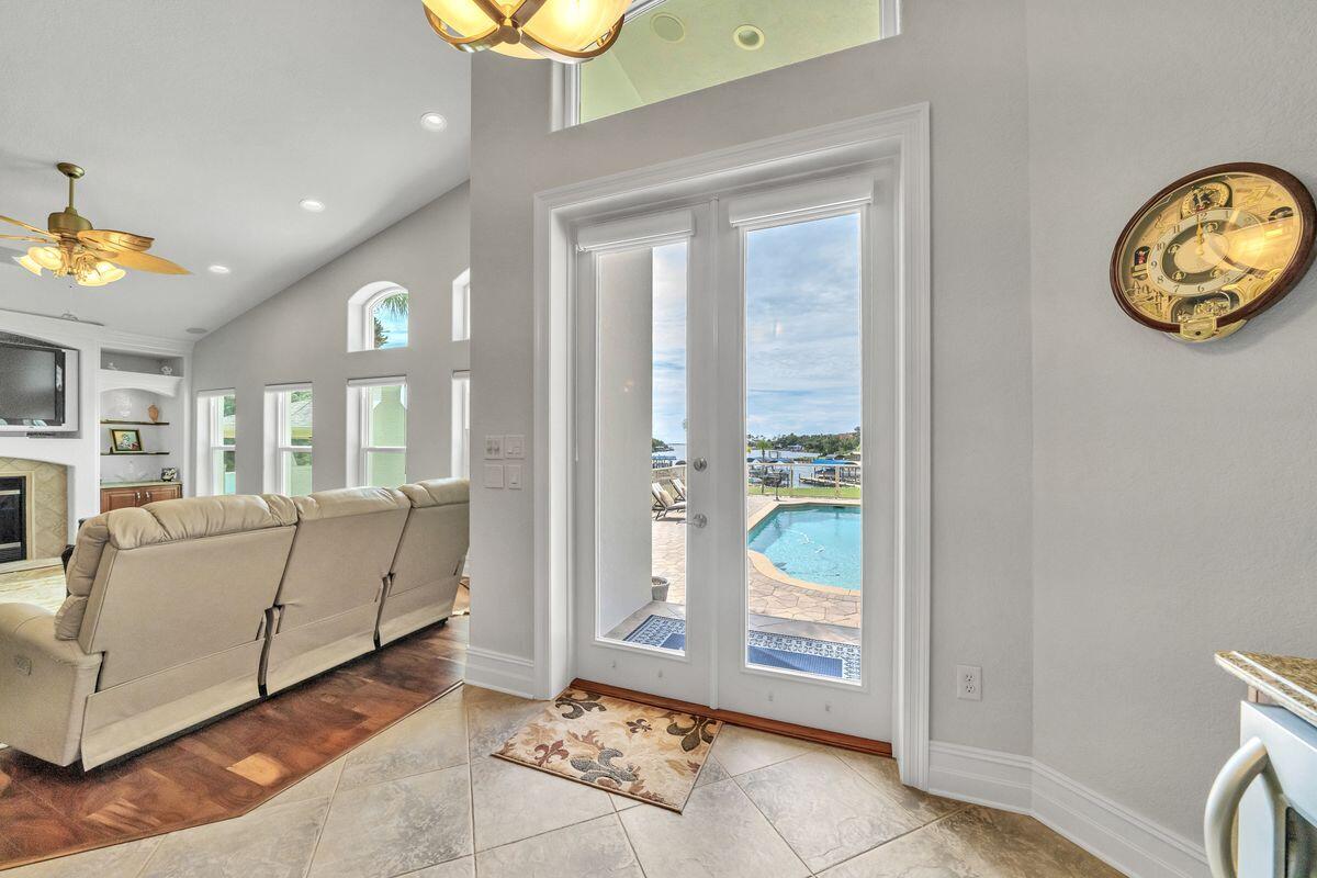 245 Country Club Road Shalimar, FL 32579 - Photo 32 of 46 a living room with furniture and a table