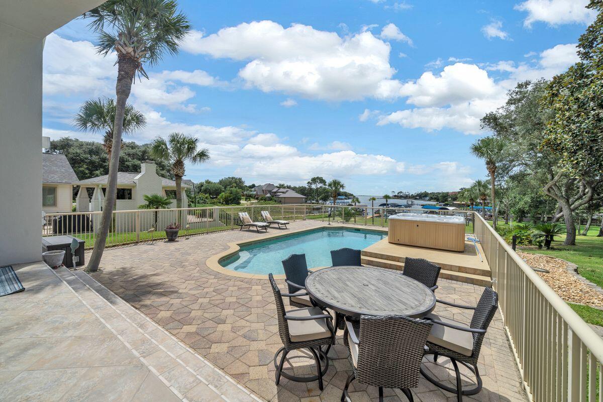 245 Country Club Road Shalimar, FL 32579 - Photo 38 of 46 a view of a terrace with sitting area