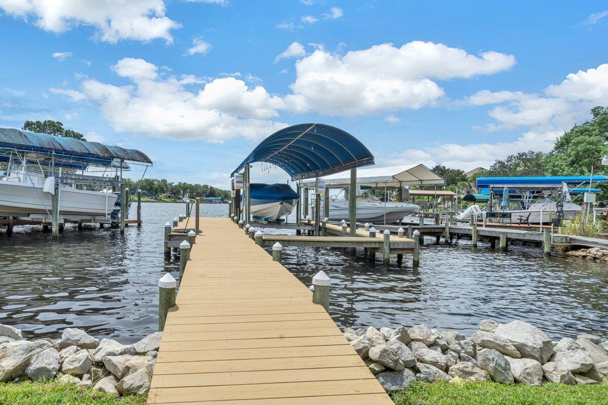 245 Country Club Road Shalimar, FL 32579 - Photo 7 of 46 a view of a lake with houses