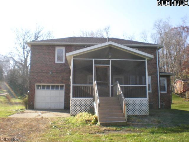 2100 Saltwell Road Northwest Dover, OH 44622 - Photo 1 of 6 relax in the summer on the porch,