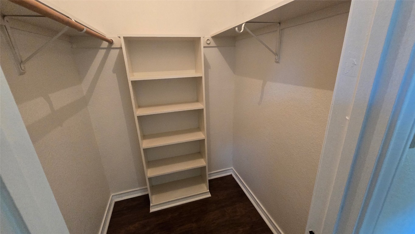 365 Pine Tree Loop Bastrop, TX 78602 - Photo 17 of 22 a view of walk in closet with empty racks