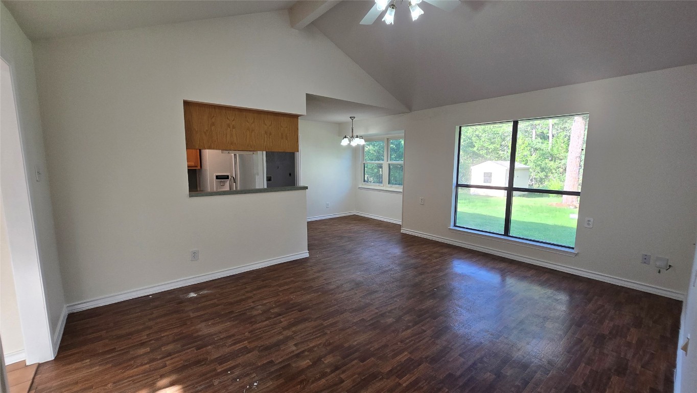 365 Pine Tree Loop Bastrop, TX 78602 - Photo 6 of 22 a view of a room with wooden floor and natural light