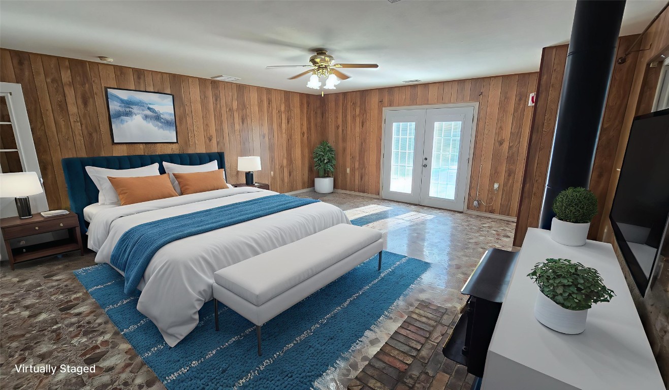 365 Pine Tree Loop Bastrop, TX 78602 - Photo 7 of 22 a spacious bedroom with a bed and a chandelier