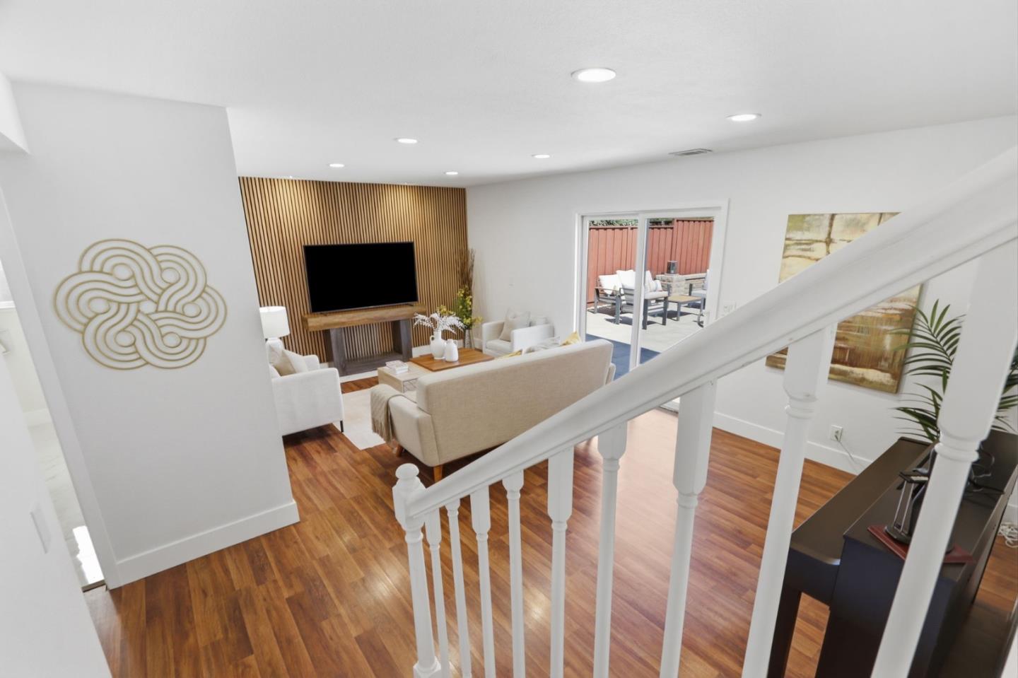 5888 Lean Way San Jose, CA 95123 - Photo 19 of 54 a living room with furniture and a flat screen tv