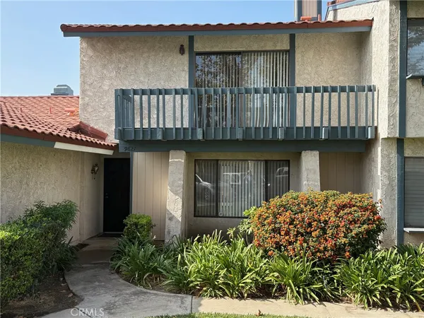 a front view of a house with balcony