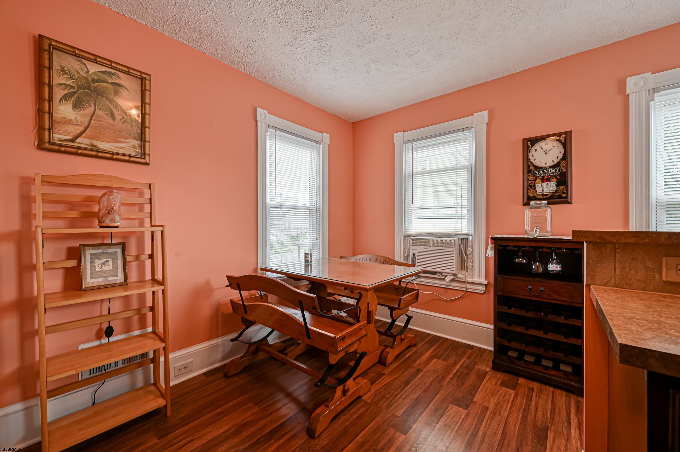 820-822 Shore Somers Point, NJ 08244 - Photo 18 of 27 a living room with furniture a wooden floor and next to a window