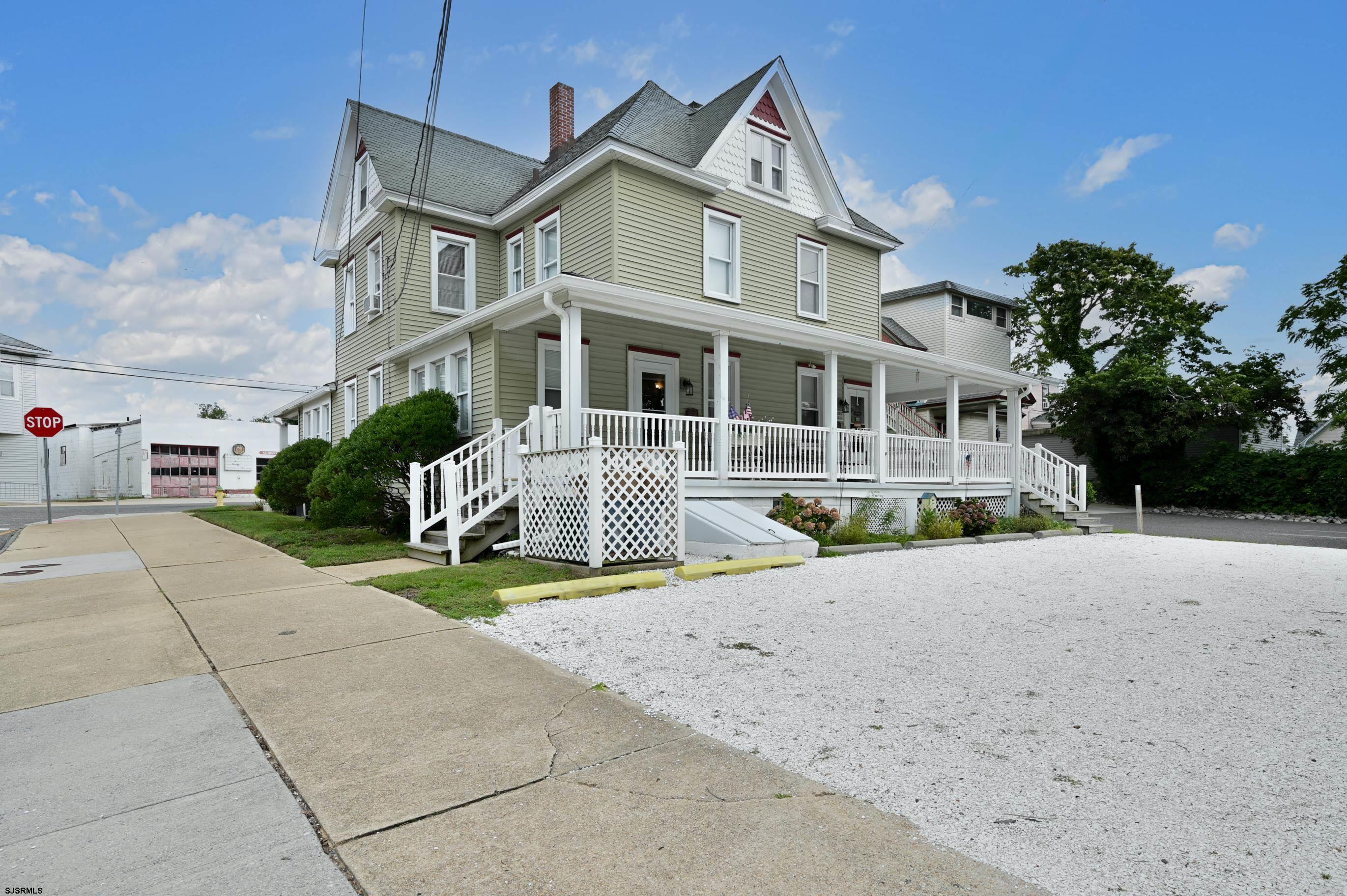 820-822 Shore Somers Point, NJ 08244 - Photo 26 of 27 a front view of a house with a yard and garage