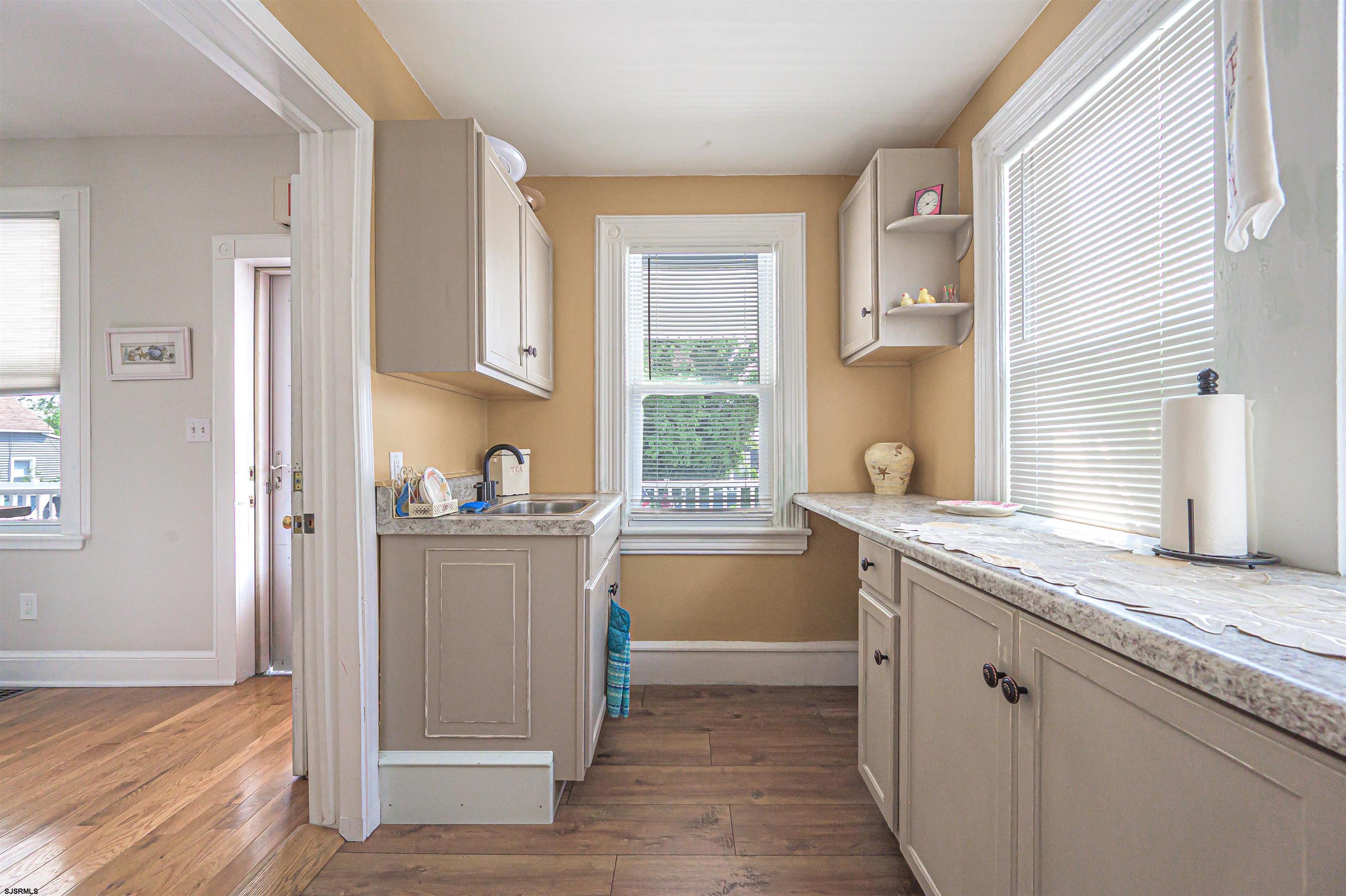 820-822 Shore Somers Point, NJ 08244 - Photo 9 of 27 a kitchen with a sink cabinets and window