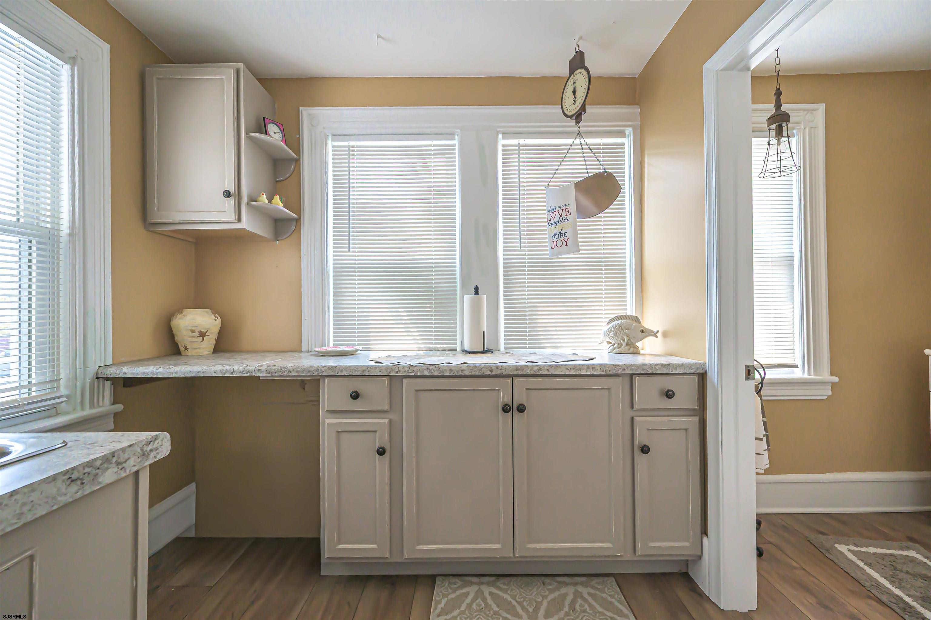820-822 Shore Somers Point, NJ 08244 - Photo 10 of 27 a kitchen with cabinets and window