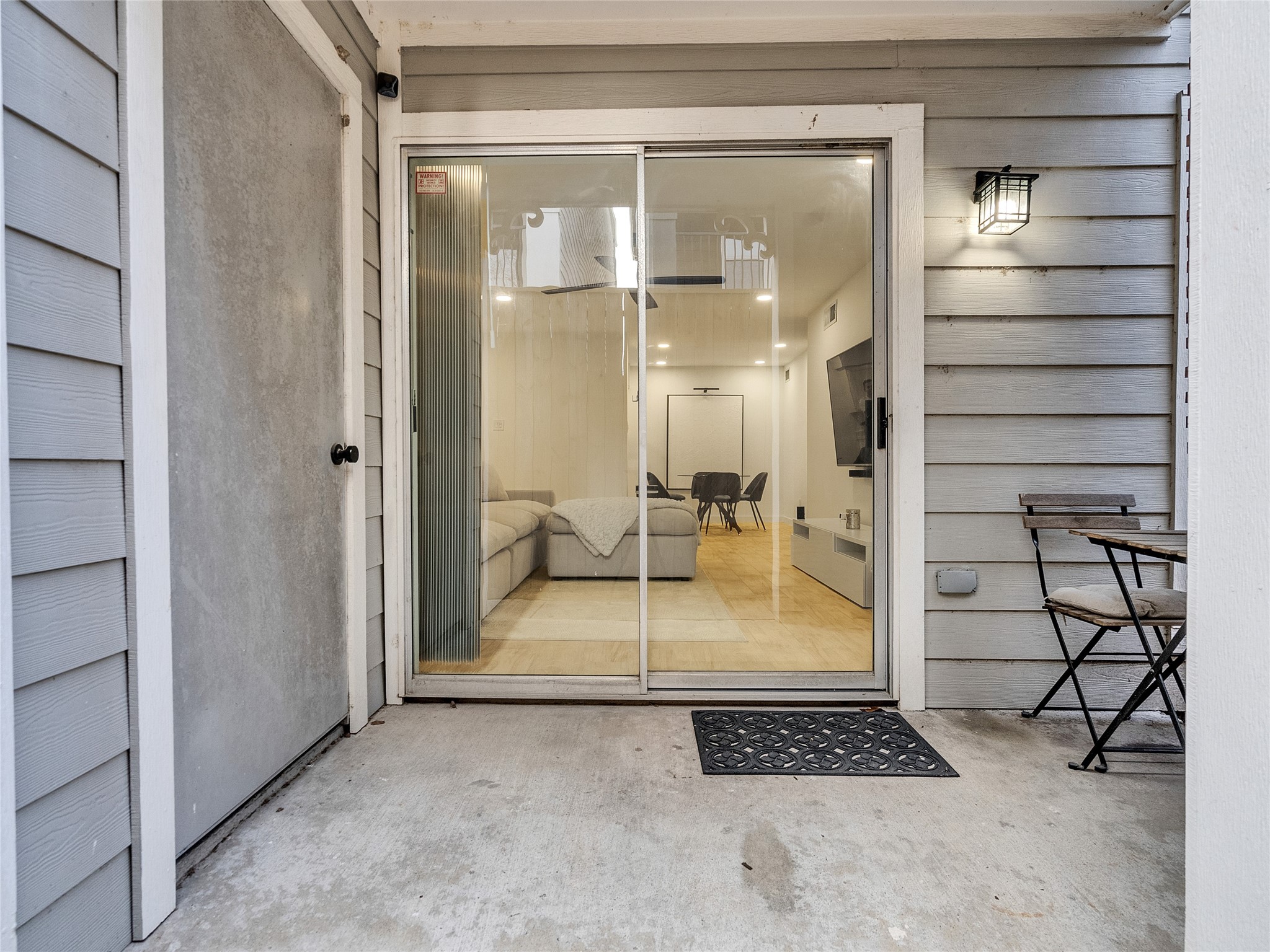 4200 Watson Street, Unit 201 Houston, TX 77009 - Photo 15 of 21 a bathroom with a glass shower door and a mirror