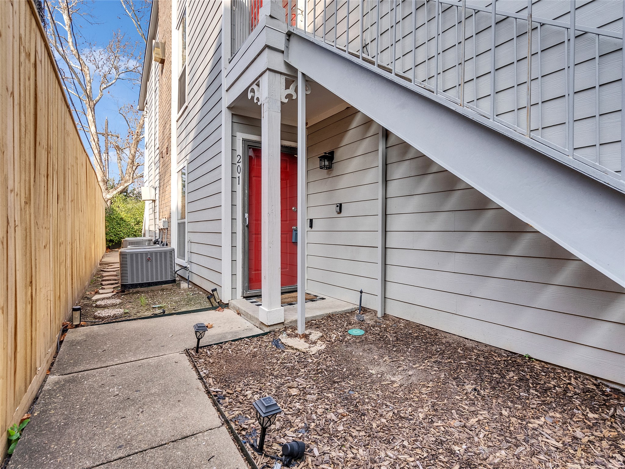 4200 Watson Street, Unit 201 Houston, TX 77009 - Photo 16 of 21 a view of house with wooden stairs