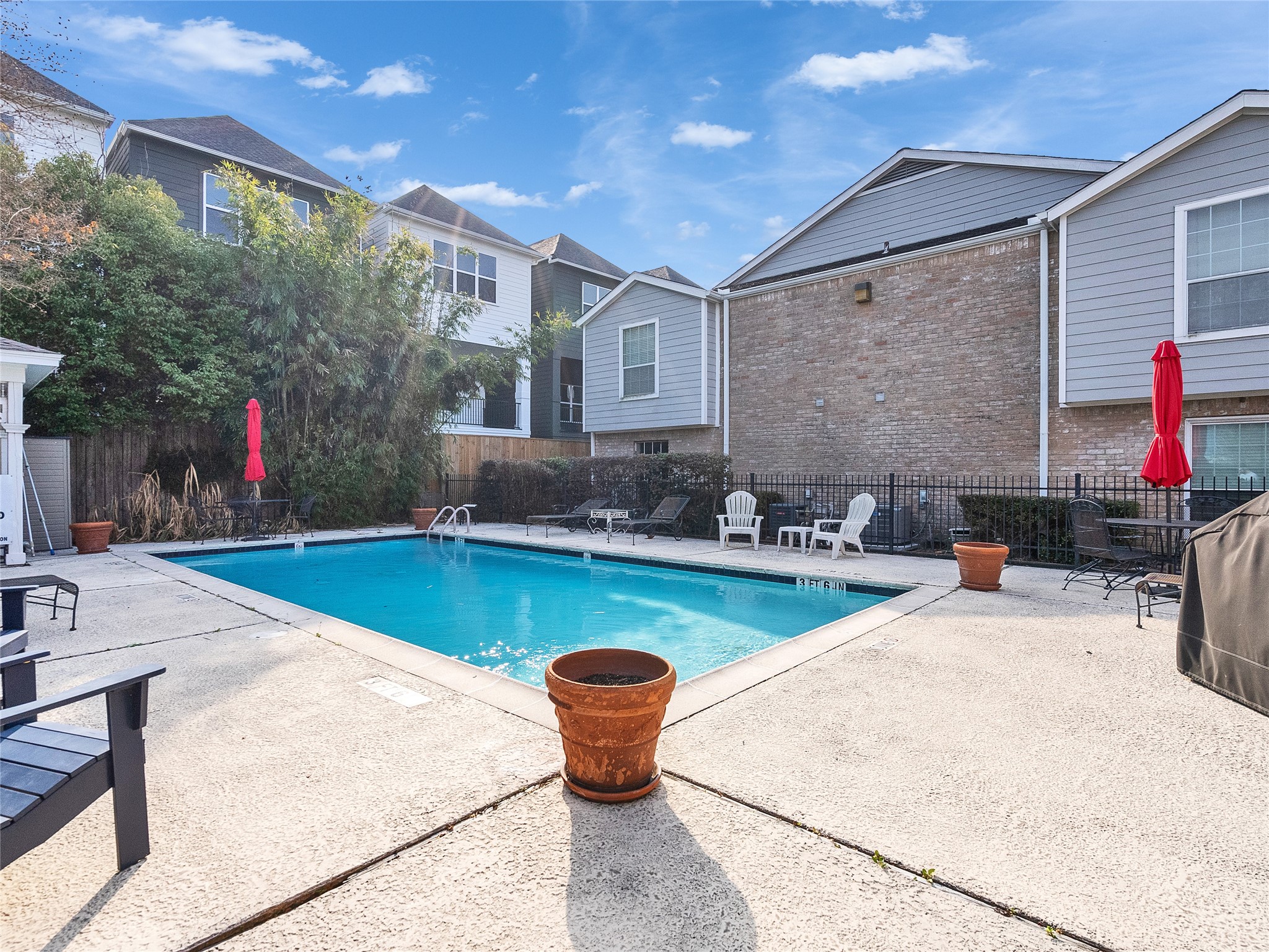 4200 Watson Street, Unit 201 Houston, TX 77009 - Photo 19 of 21 a front view of a house with swimming pool