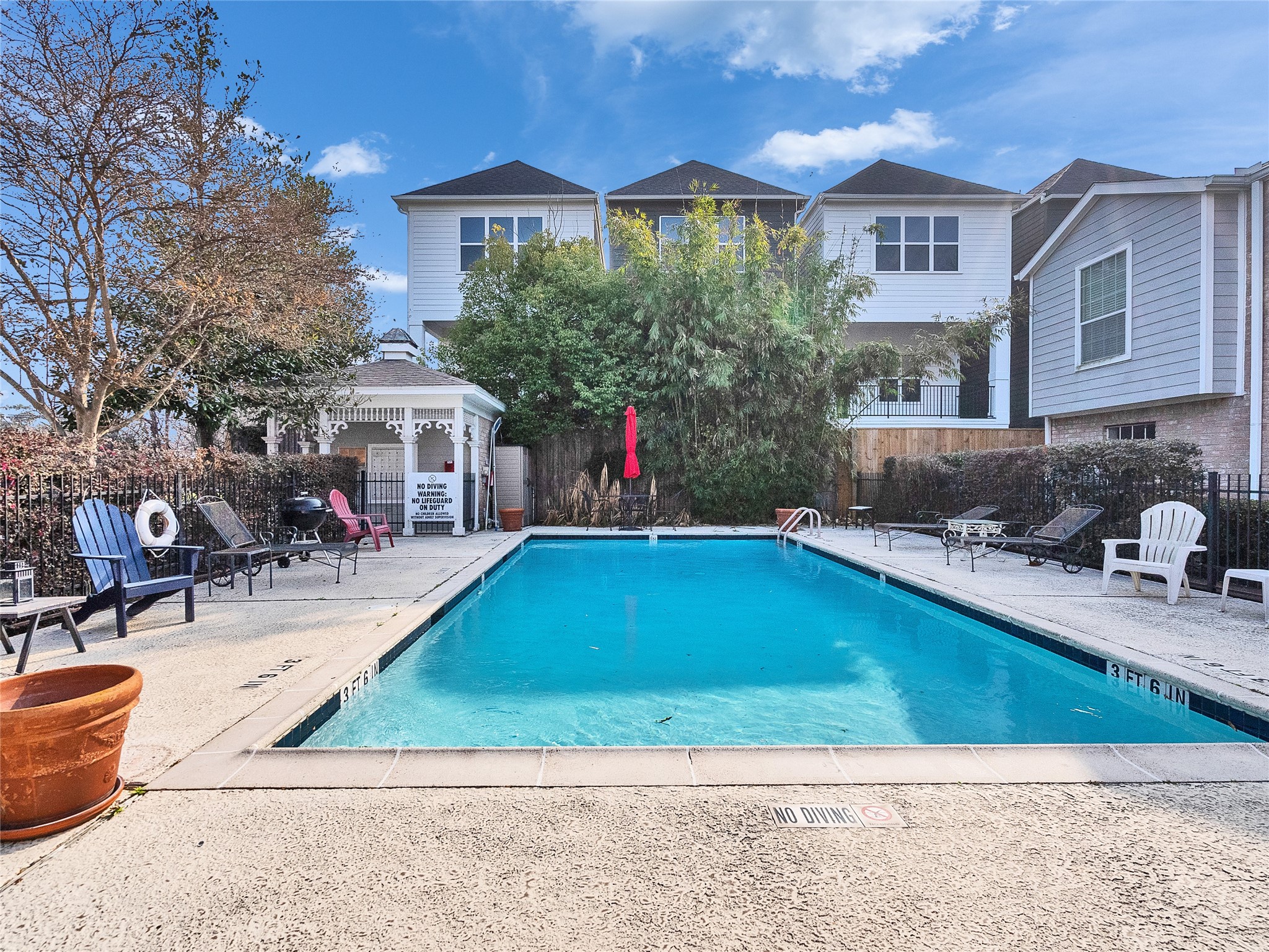 4200 Watson Street, Unit 201 Houston, TX 77009 - Photo 20 of 21 a view of outdoor space yard and swimming pool