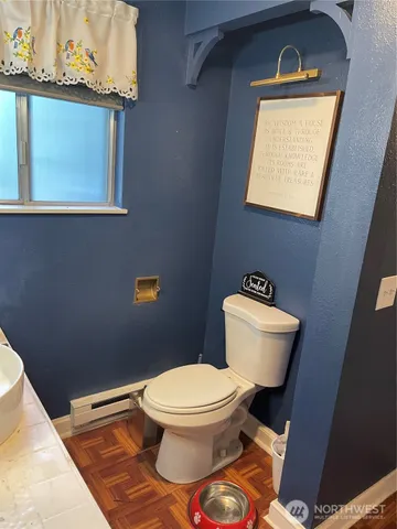 a kitchen with a sink appliances and a window