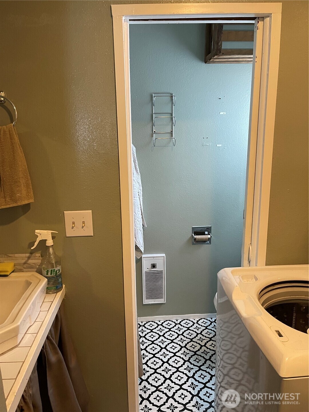 16460 Scandia Road Northwest Poulsbo, WA 98370 - Photo 18 of 33 a bathroom with a sink and a toilet