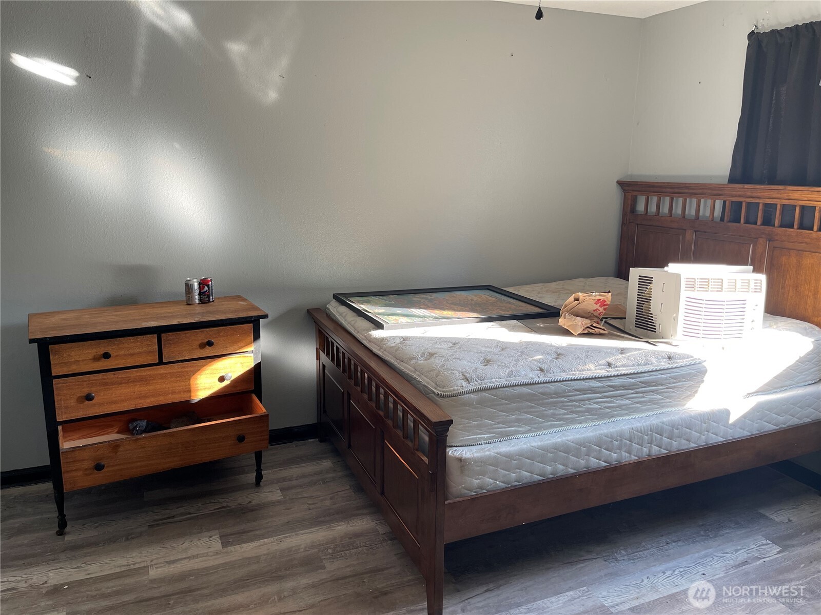 16460 Scandia Road Northwest Poulsbo, WA 98370 - Photo 19 of 33 a bedroom with bed and a window