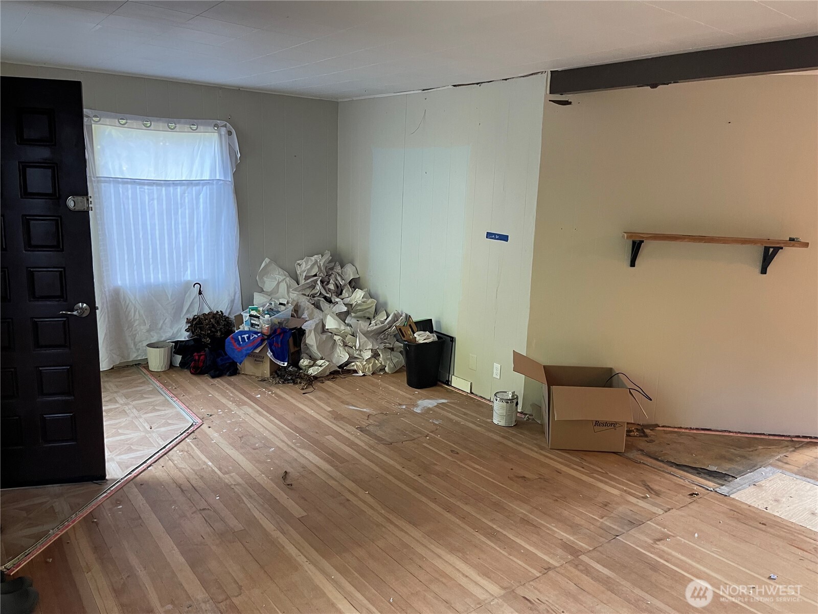 16460 Scandia Road Northwest Poulsbo, WA 98370 - Photo 5 of 33 a room with a wooden floor and furniture