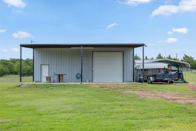 a view of a big yard with a house