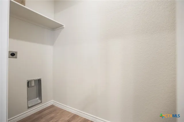 a view of small space with wooden floor