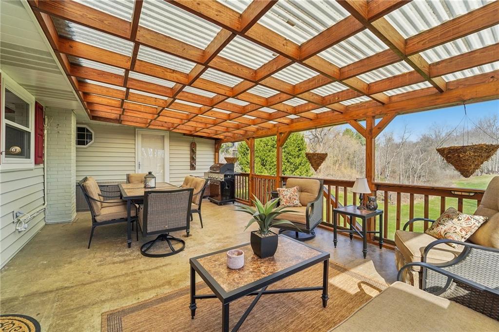 2691 Harlansburg Road New Castle, PA 16101 - Photo 23 of 42 a patio with patio outdoor seating and city view