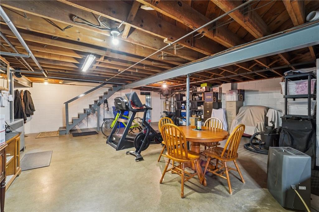 2691 Harlansburg Road New Castle, PA 16101 - Photo 25 of 42 a view of a storage room with a table and chairs