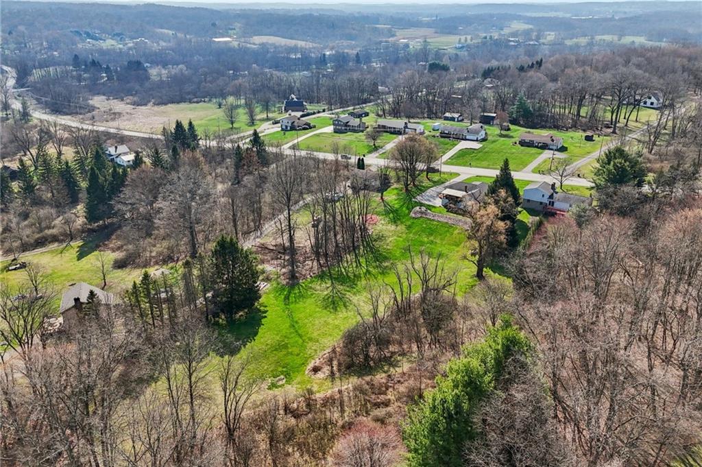 2691 Harlansburg Road New Castle, PA 16101 - Photo 37 of 42 a view of a lake with a building in front of it